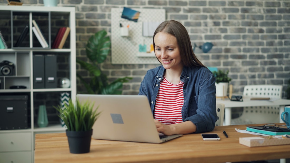 A graduate engineer at a laptop on their first engagement.
